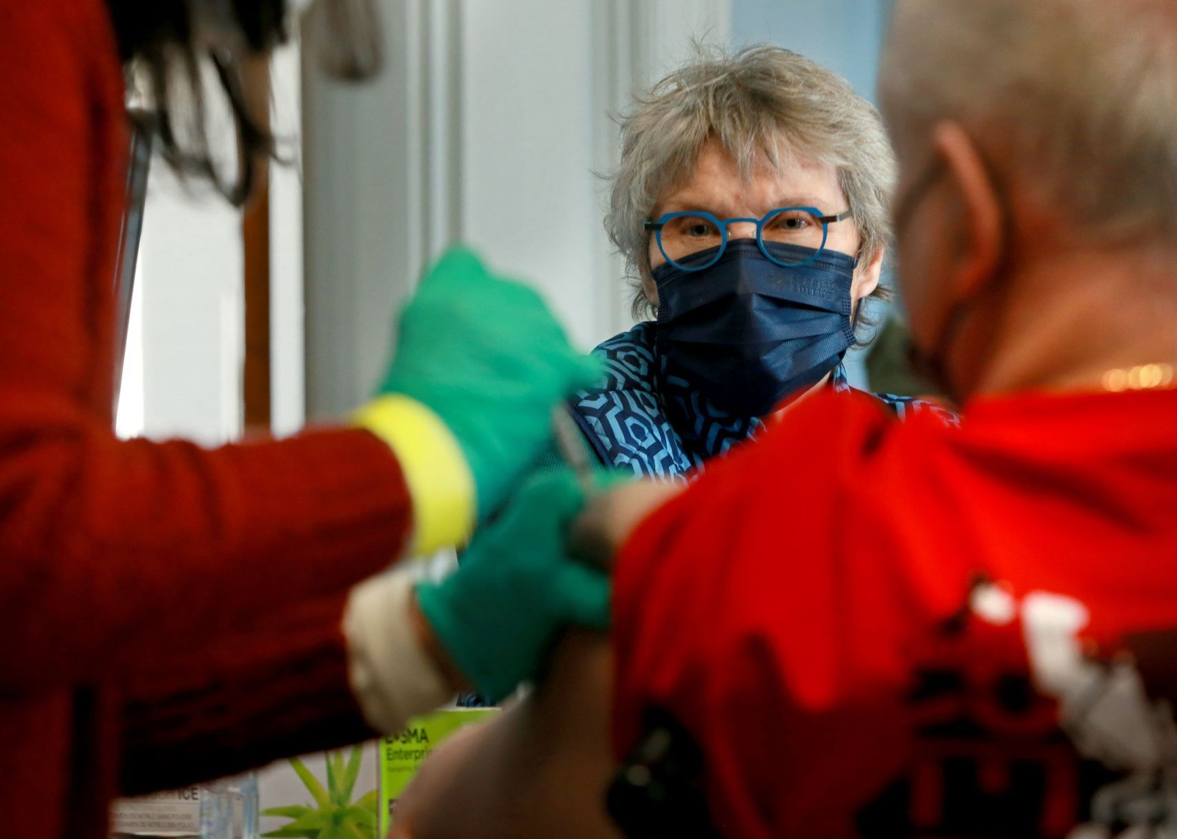 Couple falls on two sides of vaccine access plan